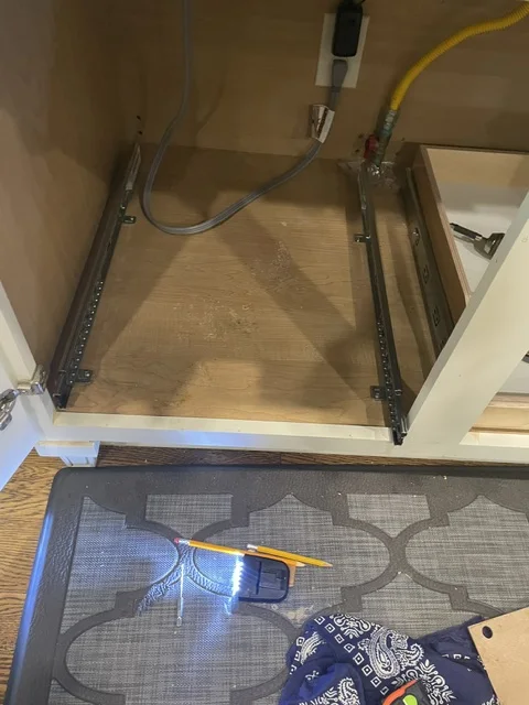 During — slide hardware installed inside the cabinet