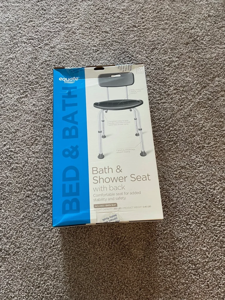 Before — bath and shower seat in packaging