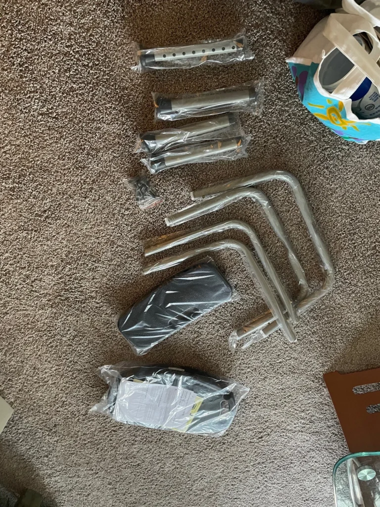 During — bath and shower seat components prepared for assembly